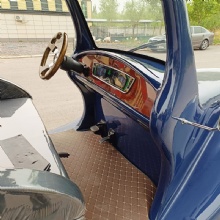 Retro-style custom-colored sightseeing electric vintage car